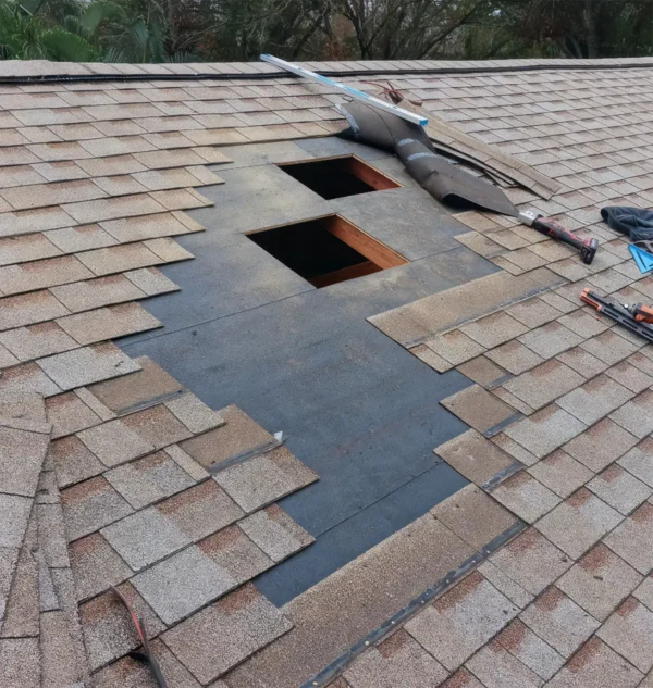 Roof repair in progress by Done Rite Roofing